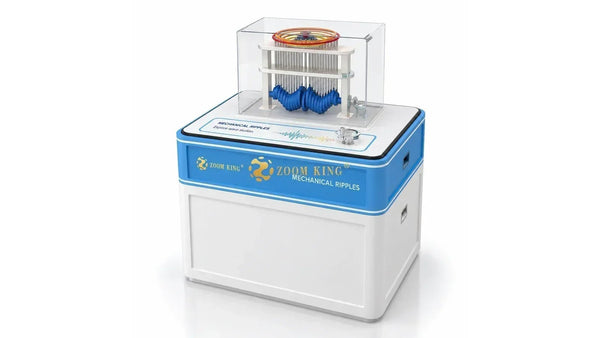 Mechanical Ripple exhibit with concentric rings, a handwheel and a transparent enclosure