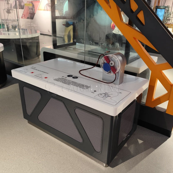 Hands-on flying rope exhibit installed in a science museum environment
