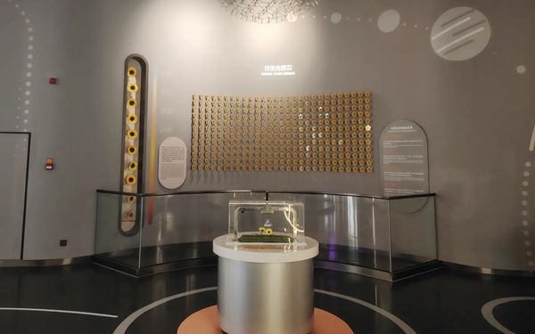 Immersive material science exhibit with interactive educational experience
