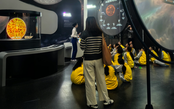 Interactive science center exhibit installation in large public museum space
