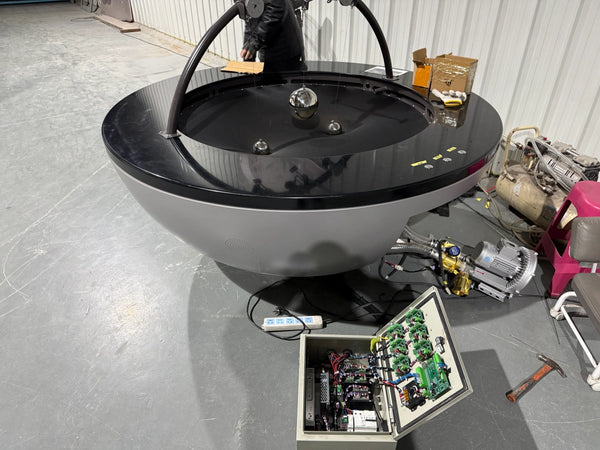 Safety and compliance considerations for interactive science exhibits including mechanical and electrical protection