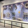 Interactive mechanics wall display showcasing classical motion principles