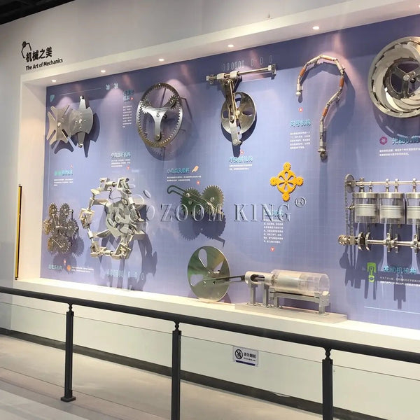 Interactive mechanics wall display showcasing classical motion principles
