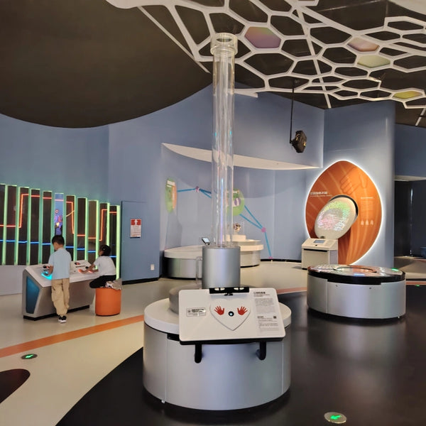 Interactive physics science exhibits demonstrating force motion and energy principles