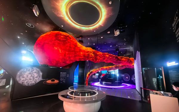 Completed interactive science museum exhibits installed in large public exhibition spaces