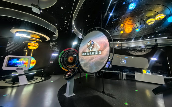 Completed interactive science museum exhibits installed in large public exhibition spaces