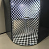 Interior view of invisible man optical illusion exhibit with checkerboard mirror room
