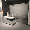 Mechanical wave phenomena interactive exhibit front view in a science museum