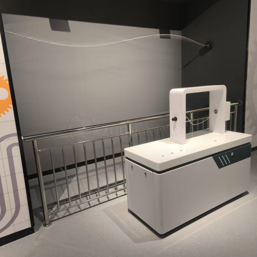 Mechanical wave phenomena interactive exhibit with visitor interaction