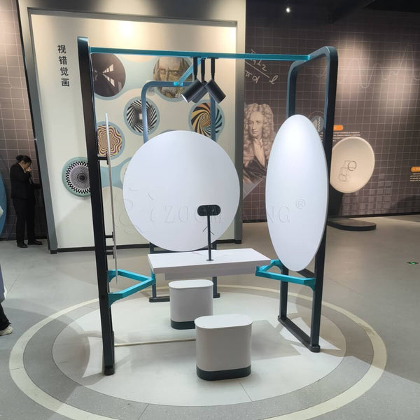 Visitor interacting with mysterious smile visual illusion research device