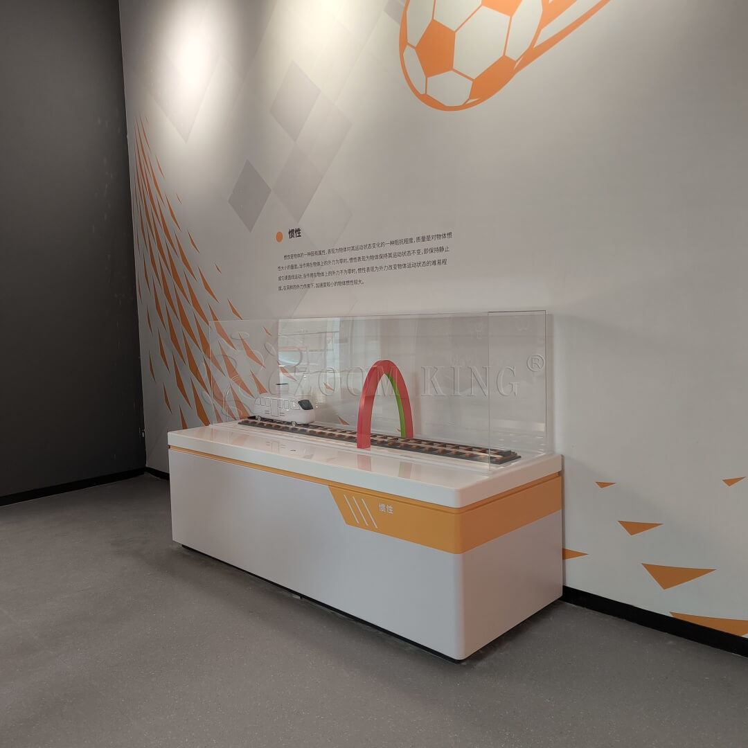 Hands-on Newton’s Second Law exhibit for science center and STEM education 
