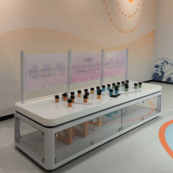 Pipeline music interactive exhibit detail showing hands-on sound frequency controls