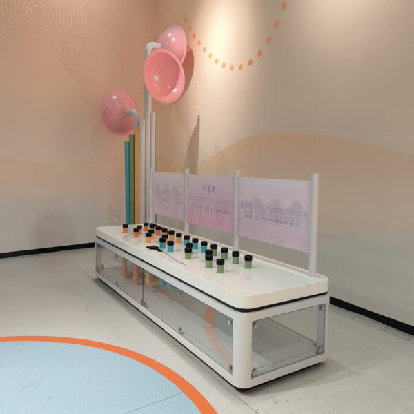 Pipeline music sound exhibit side view showing pipe length and pitch relationship