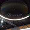 Precision-engineered science museum exhibit detail showing launch mechanism