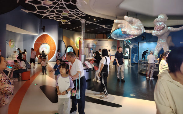 interactive science museum exhibit concept design and spatial layout
