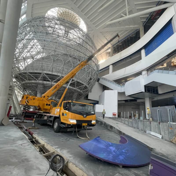 On-site installation of interactive science museum exhibits by professional engineering team
