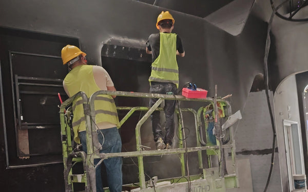 On-site installation of interactive science museum exhibits by professional manufacturer