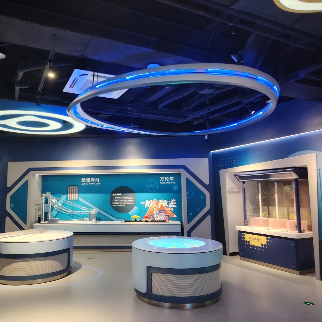 Science museum mathematics zone featuring an interactive mobius strip exhibit