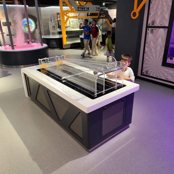 Inertia comparison slope track interactive science exhibit with dual lanes