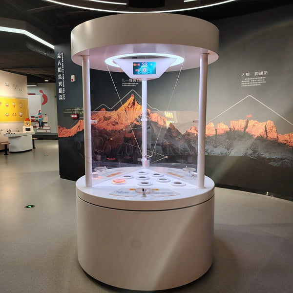 Teamwork ball control area in cooperative interactive science exhibit