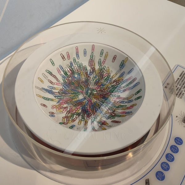 Visitor participating in magnetic field interactive science exhibit